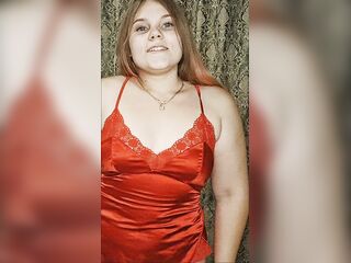 wet redhead in a red suit