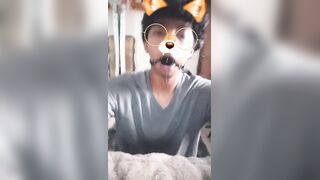 Lil femboy spitting over his gag ball while juggling on his faux-cock
