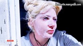 Blonde bimbo applies gooey mask to her pasty skin &mdash;  winking for the cameras