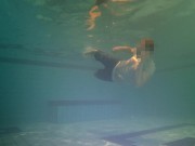 Swimming in clothes underwater