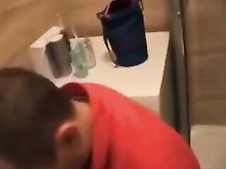 Footjob wife makes him lay down in the baths