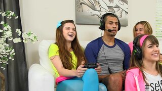 Three teen babes seduce a gamer and suck his huge dick