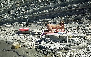 Awesome kinky nudist girl in sunglasses sucks & rides a huge dildo in public beach - Sasha Bikeyeva