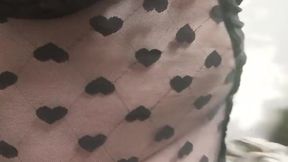I'm wearing a wide mini with hearts, red transparent stockings and my stiletto heels and I feel