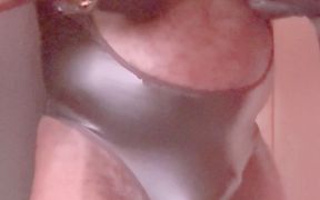 Latex Singlet Muscle Flex Precedes Bate Bust