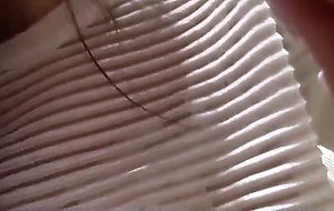 Brunette makes a selfie in the store changing rooms