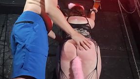 Redhead slut girl gets hard swatting in public dungeon
