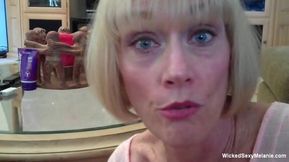 Blonde grandma is tugging and sucking cock in POV