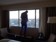 spider shoots onto hotel window