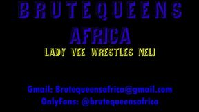 Lady Vee wrestles Neli to submission