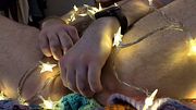 FTM rubbing pussy with fairy lights insertion