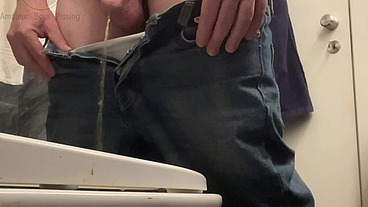 Amateur Boy in Jeans Shorts with Big Hanging Balls Caught Pissing Hands Free