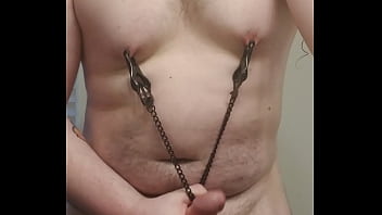 Fat boy playing with clamps for