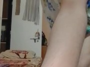Nude crossdresser femboy in girl's top only.