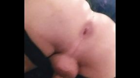 Cross dresser in Fishnets and panties takes large dildo