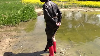In the mud: Handcuffs, pissing and rubber boots