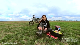 Naked woman riding a Dirt Bike