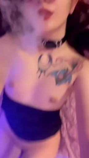 I smoke and smoke falls on a shaved pussy