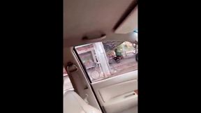 she is a very horny shemale wanking it in the car and busted