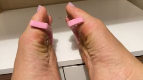 stretching the fingers with a manicure tool