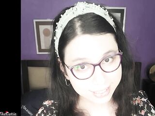 Nice-looking lil transsexual DaniTheCutie holds a thick sex toy in her tight booty this Christmas