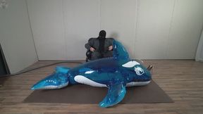 Sonya experiments with a vibrator inside an inflatable orca whale part 2