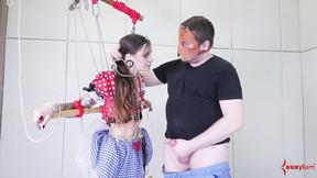 ”Tied up sub deepthroats cock”