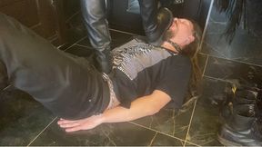 Licking two pairs of shoes, spits from the soles and trampling