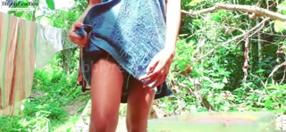Sri Lankan girl bathing outdoor