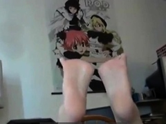 Goth emo girl licks her own feet