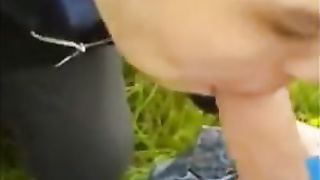 Twink sucking cock in the park and getting the cum