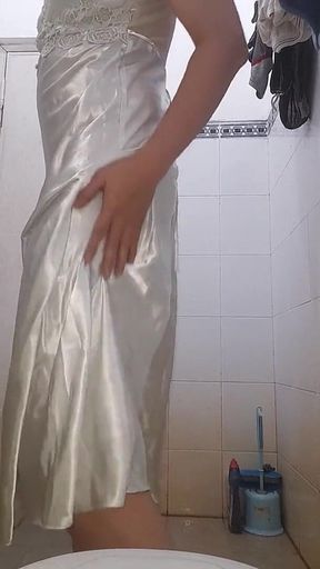 Asian Crossdresser wearing long silky nightie gown