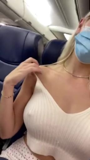 Airplane solo girl undresses in bathroom