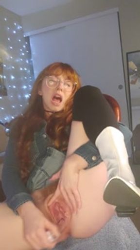 Squirting redhead makes a creamy mess