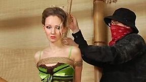 Slim and sexy blonde sweetheart is tied up and undressed