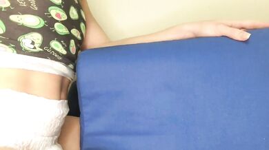 Diaper cutie fucks a pillow, plays with pussy and inserts a black dildo into a sweet vagina