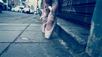 Ballerina Wearing Ballet Shoes and Walking Down The Street