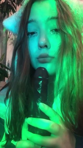 Beautiful girl passionately sucks cock