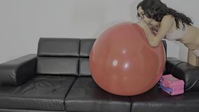Marianna has fun with her new big balloons