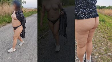 Mature exhibitionist strips in public flashing her big ass and tits