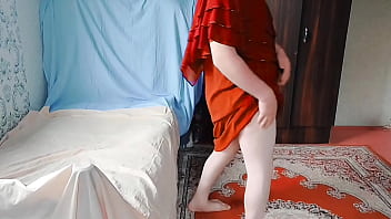 Gorgeous shemale holding heart-shaped balloon playfully