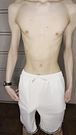 a twink's big dick shows through his shorts when he works out