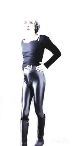 Crossdresser shakes his ass on webcam and dance hot in skin tight Latex Leggings with small cock