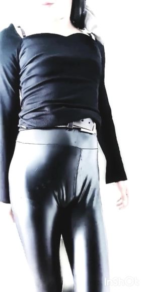 Crossdresser shakes his ass on webcam and dance hot in skin tight Latex Leggings with small cock