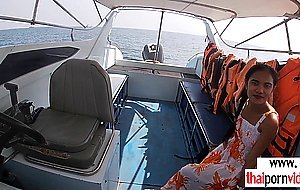Skinny amateur Thai teen Cherry fucked on a boat outdoor in doggystyle