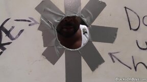 Bearded guy sucks a black dick at a gloryhole