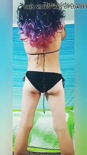 On my bed in my G-string and bra plus my black bikini ass teasing