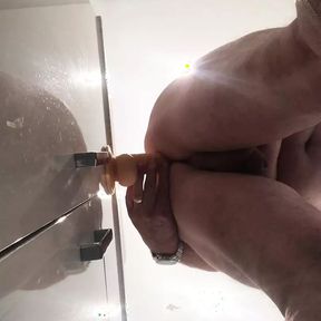 Riding dildo in the bathroom