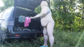 Mother-in-law masturbates her pussy in nature