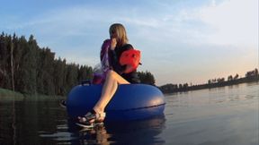 Alla swims on a large inflatable ring on the lake and inflates a transparent inflatable ring and inflatable headbands with her mouth and swims in clothes!!!